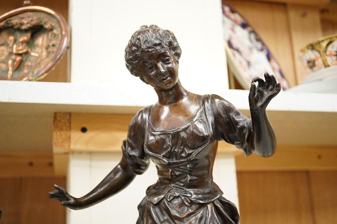 A pair of late 19th century French spelter figurines, 50cm high